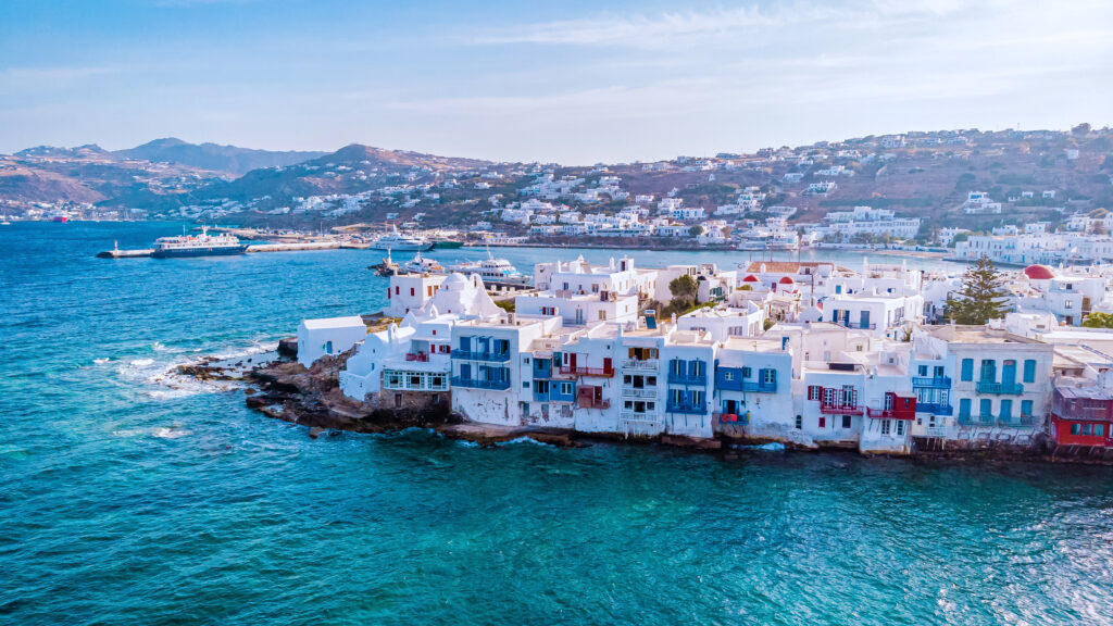 Aerial view of a colorful waterfront street in Mykonos Greece