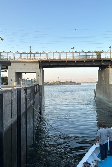 View from on board a boat docking along the Nile River in Egypt.